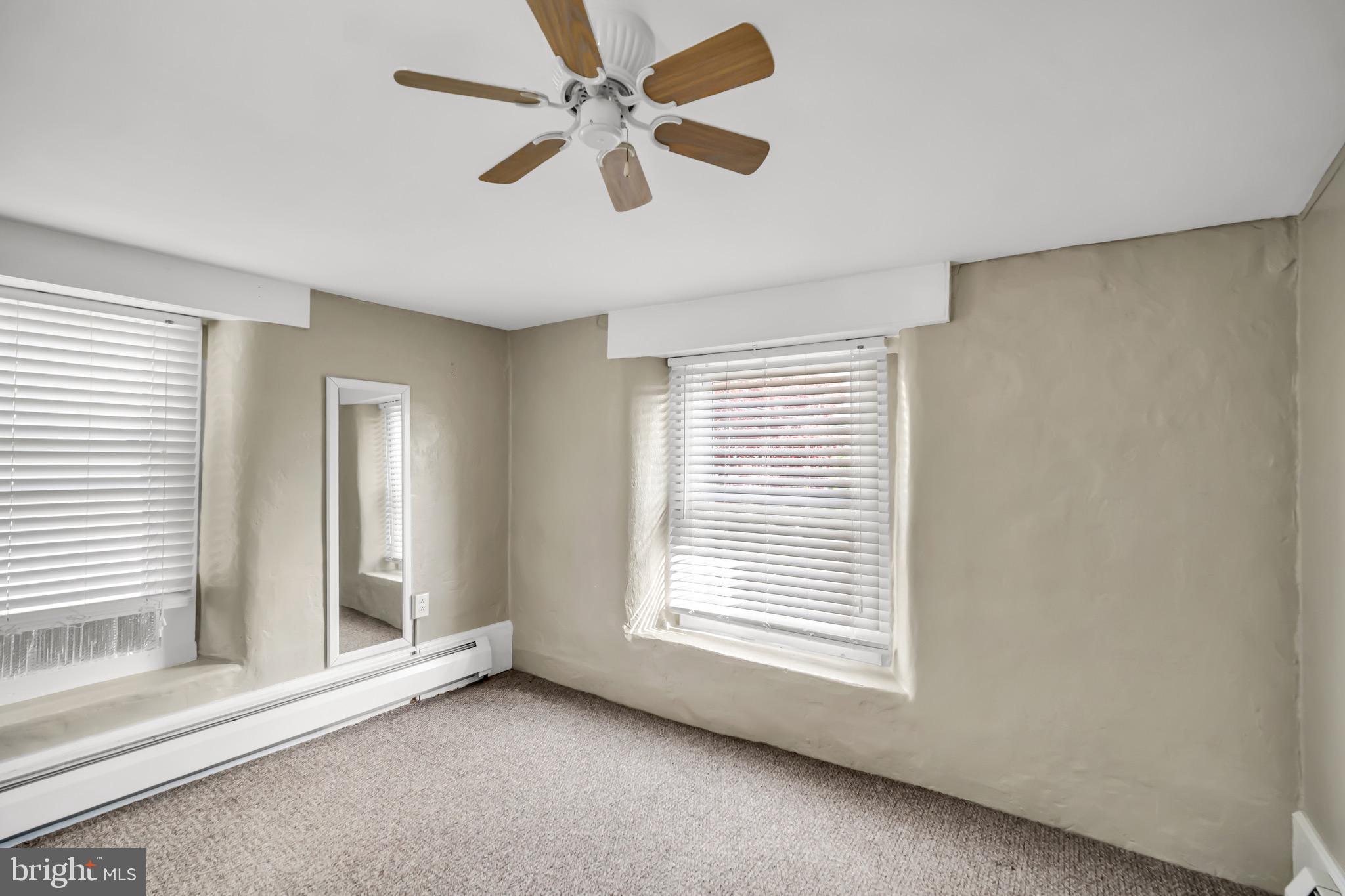 246 Cottage Avenue, Unit A Horsham, PA 19044 - Photo 14 of 21 a view of room with a ceiling fan and window