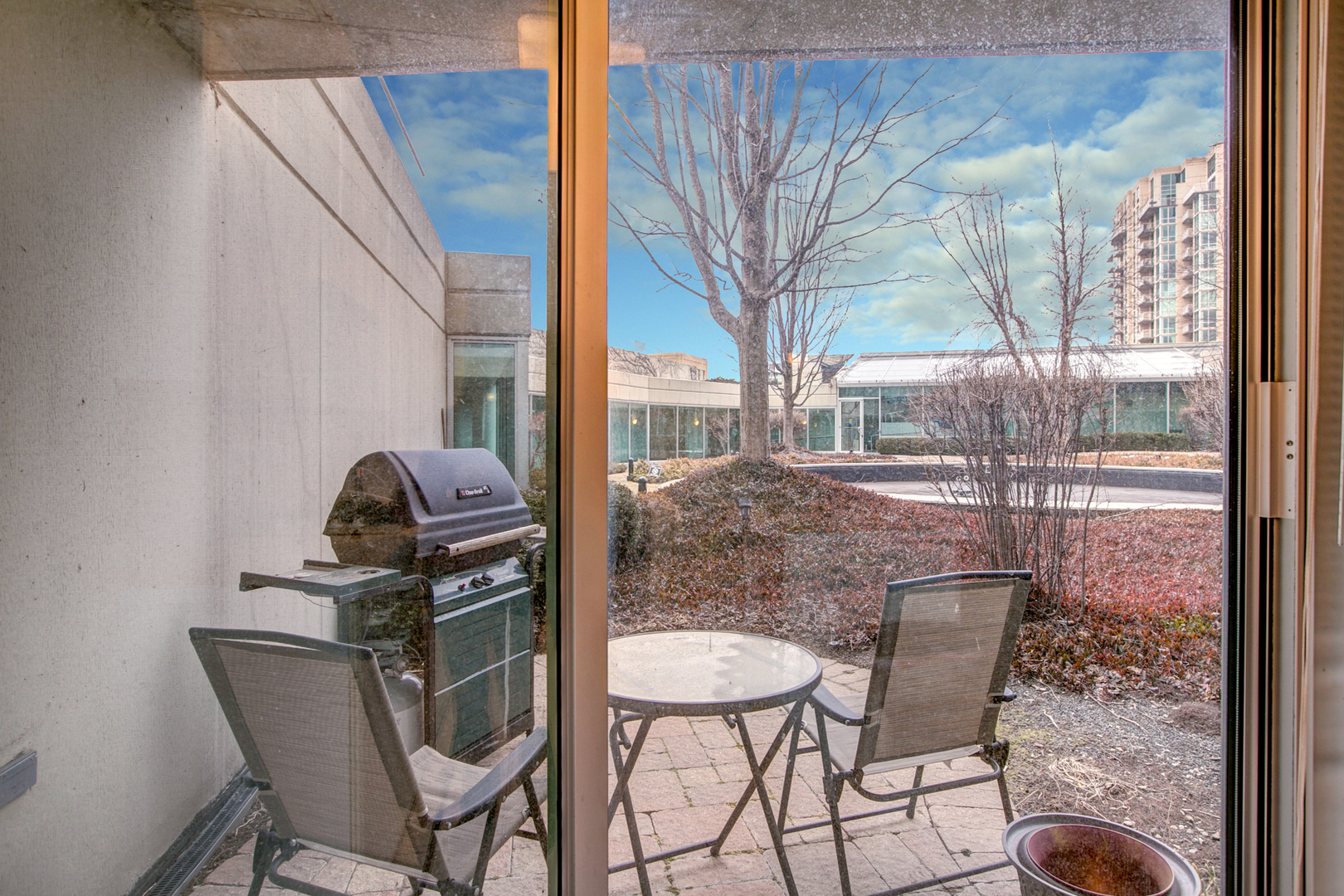 1720 Maple Avenue, Unit 407 Evanston, IL 60201 - Photo 6 of 16 a view of a chairs and table in the balcony