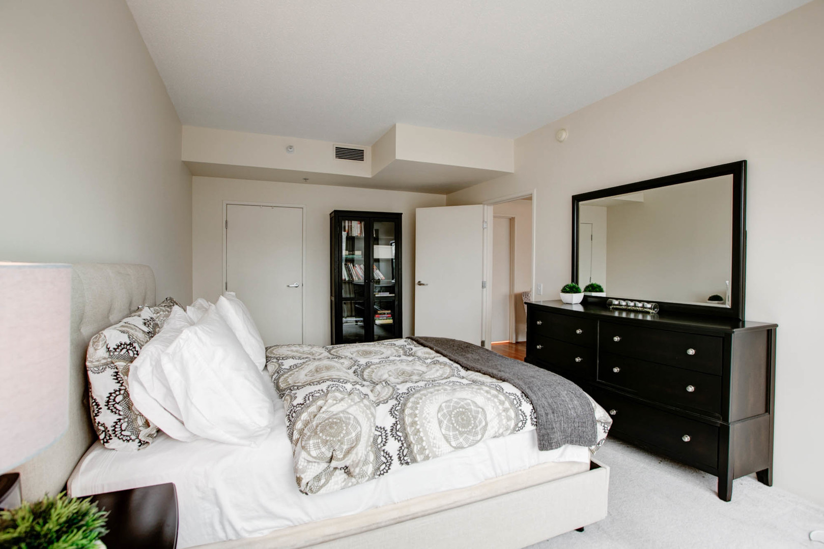 1720 Maple Avenue, Unit 407 Evanston, IL 60201 - Photo 9 of 16 a bedroom with a bed and a closet