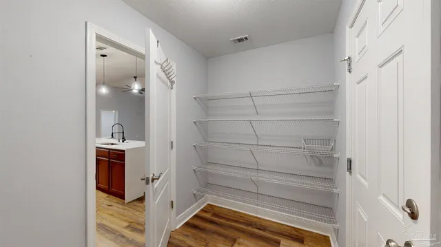 a bedroom with bed and a window