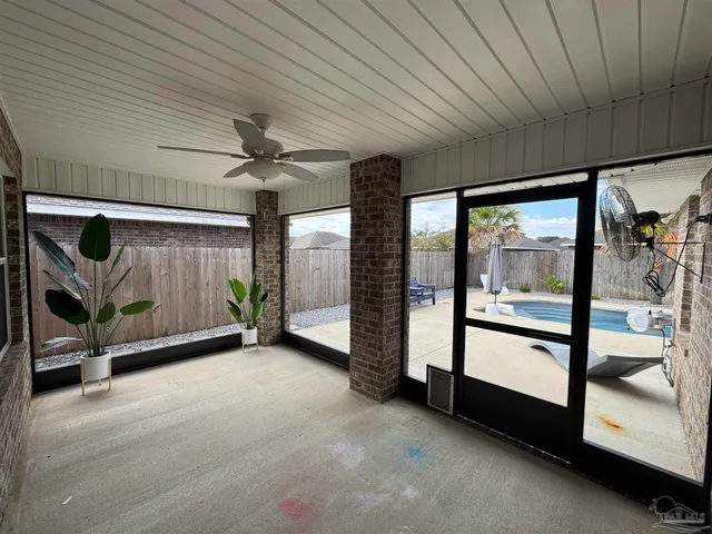 a swimming pool with view of outdoor space