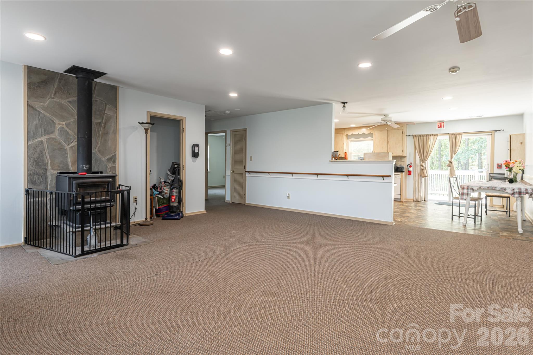 2800 Coxe Road Tryon, NC 28782 - Photo 28 of 40 a living room with furniture and a flat screen tv