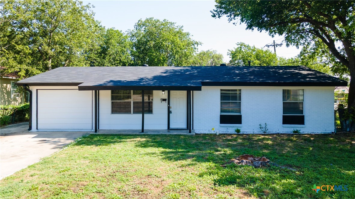 front view of house with a yard