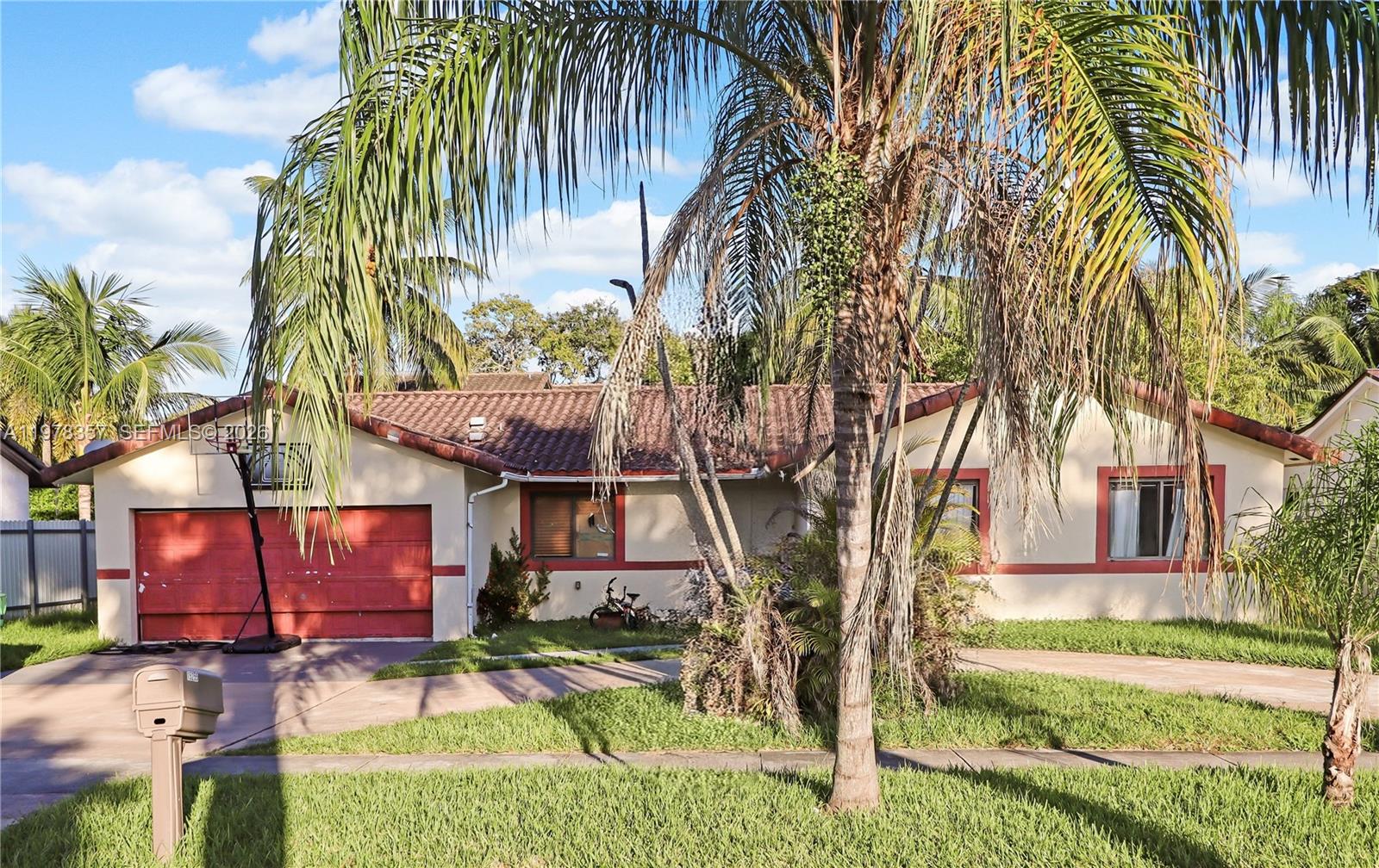15255 Southwest 99th Court Miami, FL 33157 - Photo 18 of 18 a backyard of a house with barbeque oven table and chairs