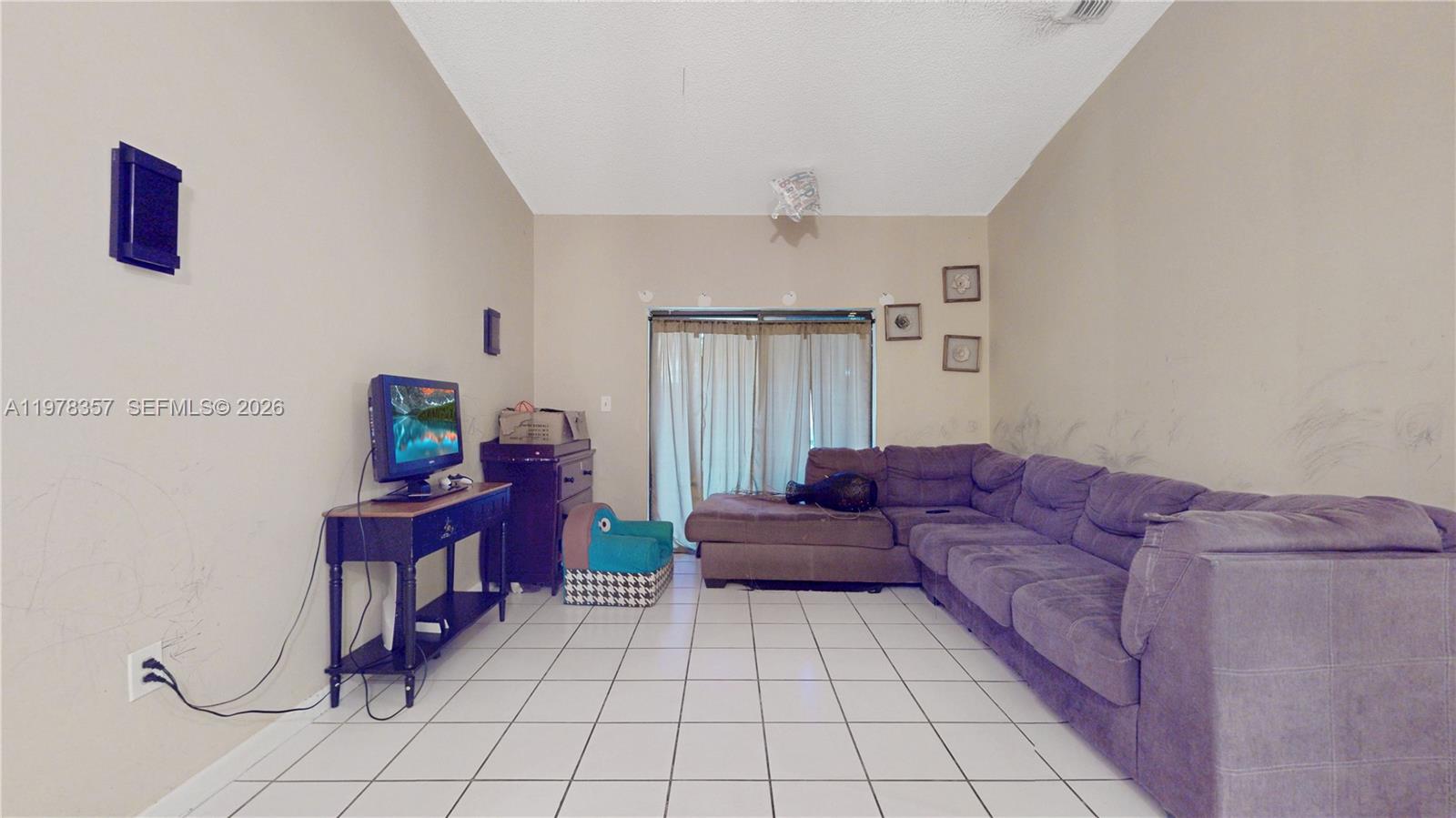 15255 Southwest 99th Court Miami, FL 33157 - Photo 3 of 18 a living room with furniture and a couch