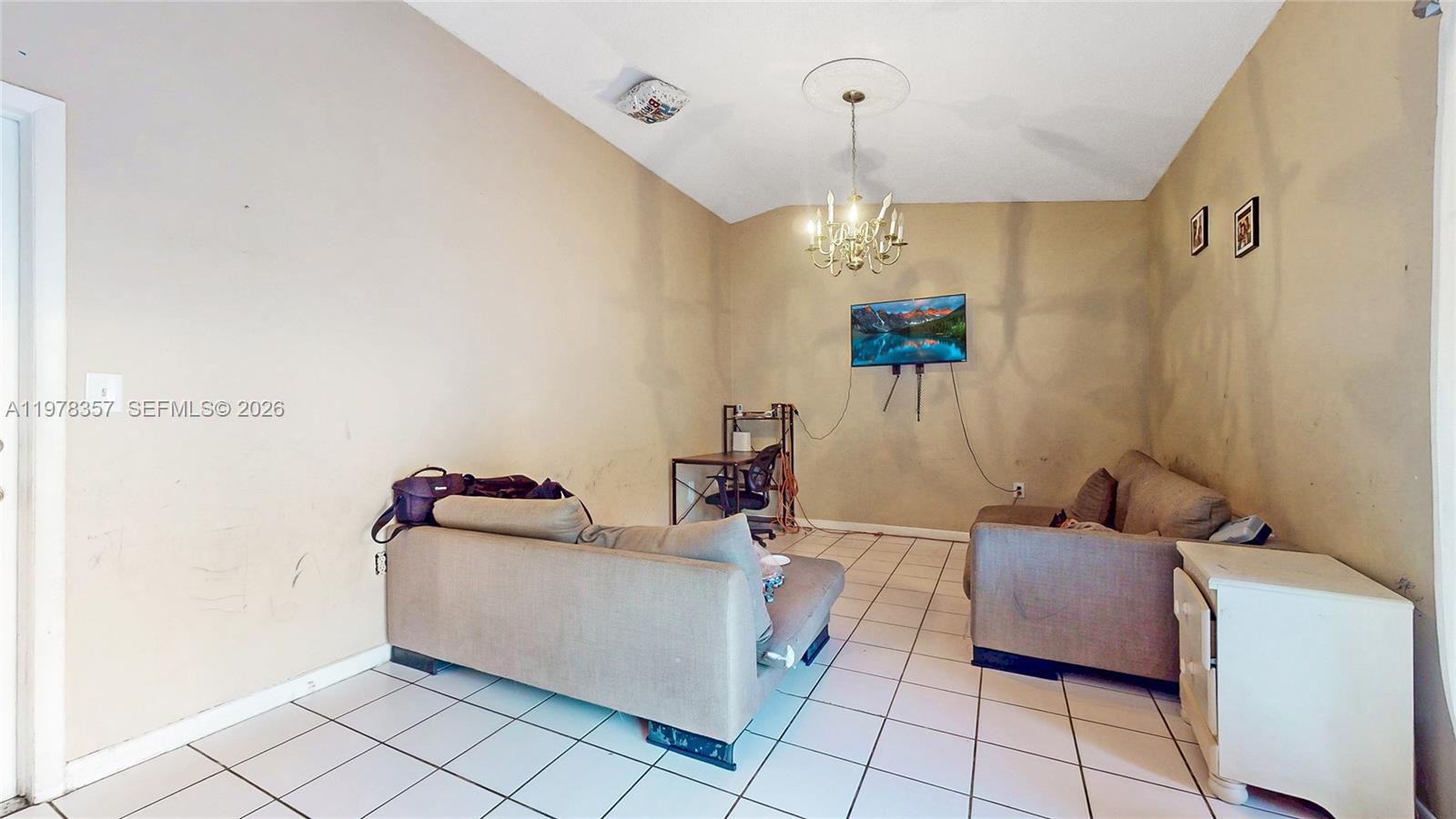 15255 Southwest 99th Court Miami, FL 33157 - Photo 6 of 18 a living room with furniture and a window