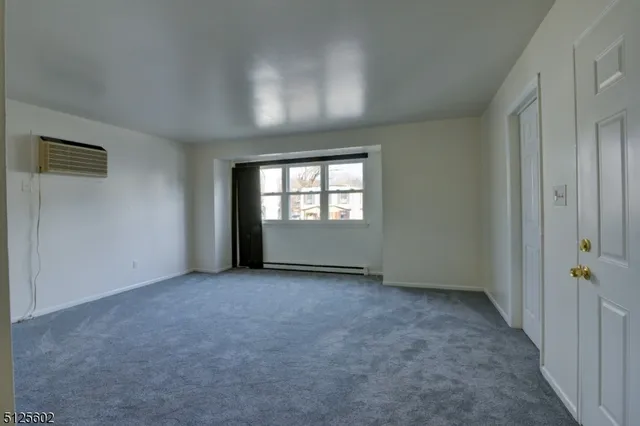 an empty room with window