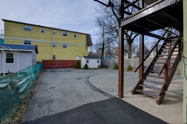 a front view of a house with garage