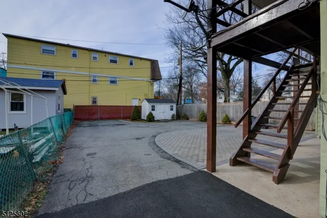 a front view of a house with garage