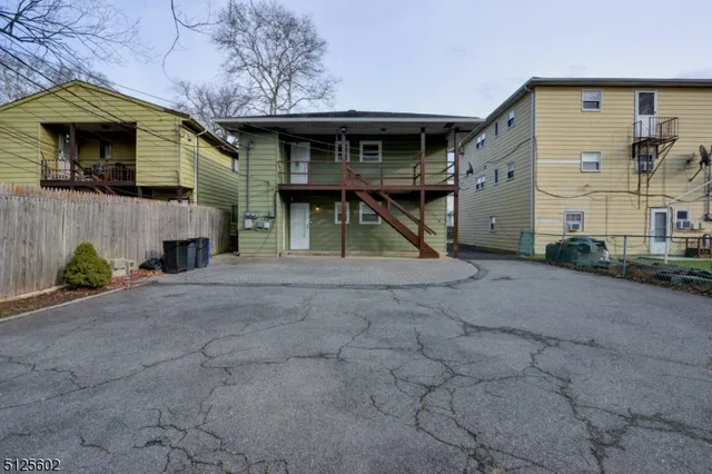 a house view with a backyard space