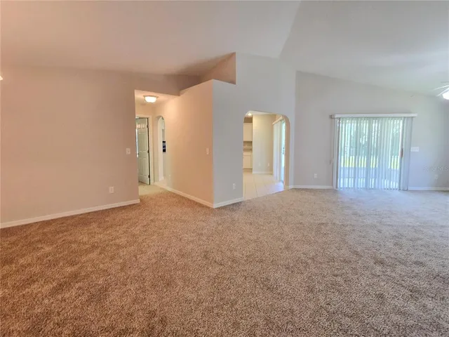 a view of an empty room with window