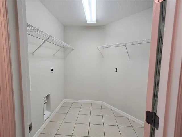 a view of an empty walk in closet