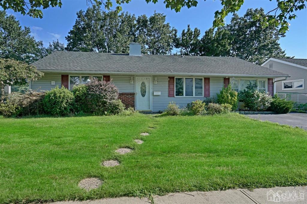 141 Winthrop Road Edison, NJ 08817 - Photo 3 of 30 a view of a house with yard and a garden