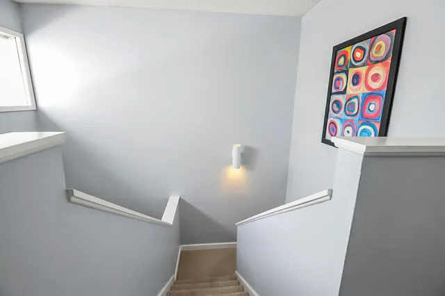 a en suite bathroom with a sink and a mirror