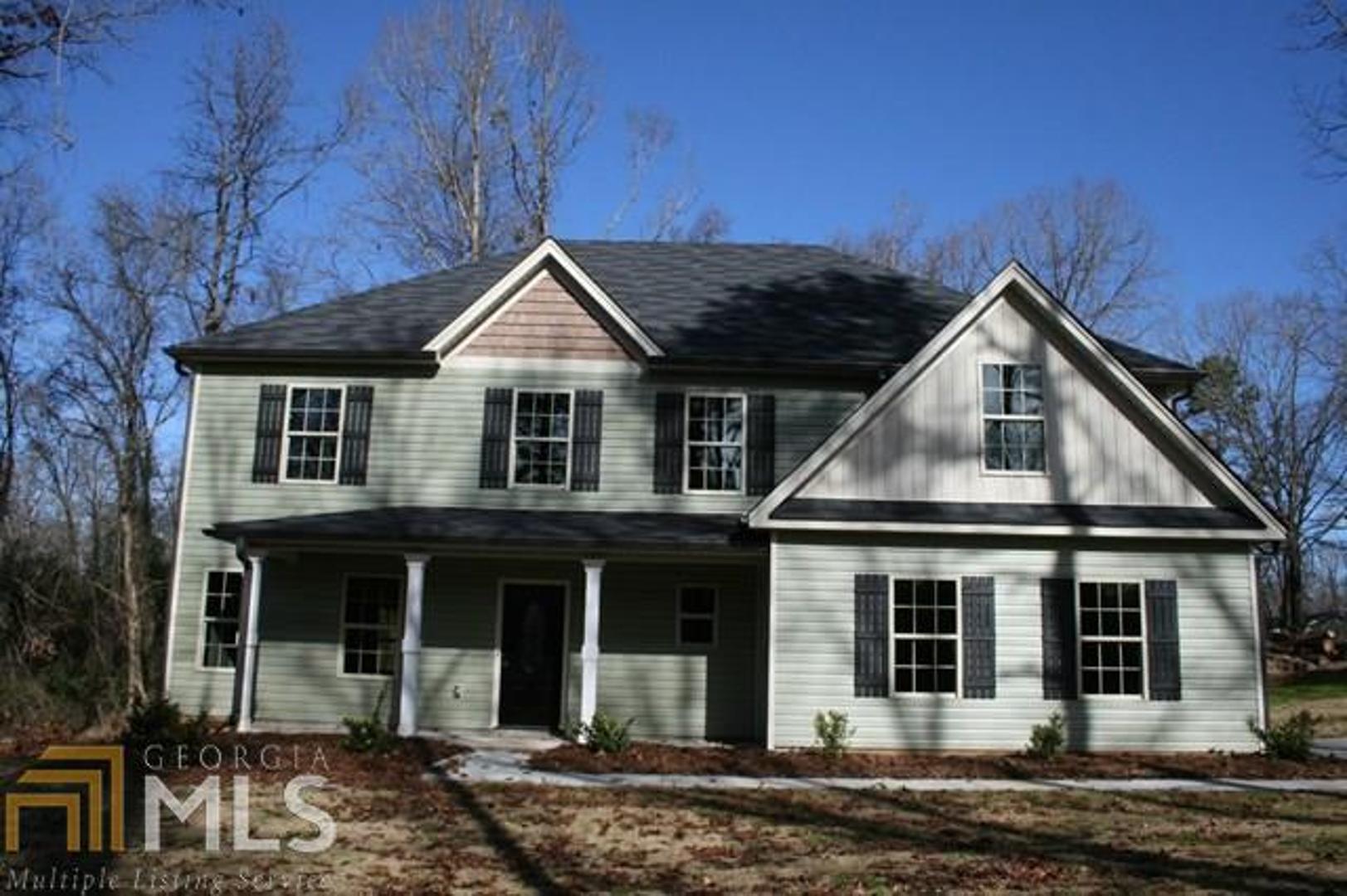 696 Hancock Bridge Road Winder, GA 30680 - Photo 1 of 1 a front view of a house with a yard
