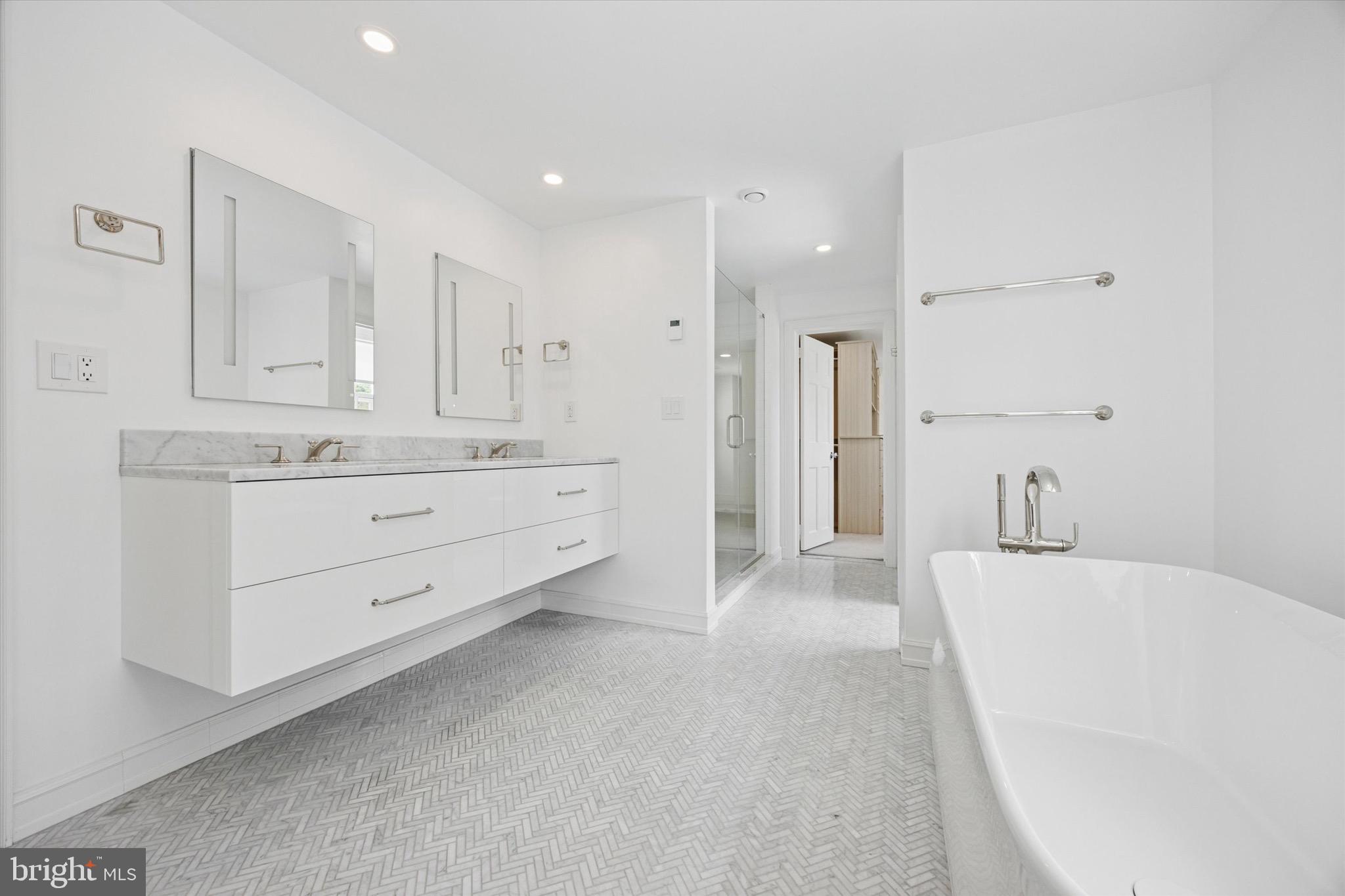 1024 North Spring Mill Road Villanova, PA 19085 - Photo 18 of 34 a view of a kitchen with white cabinets