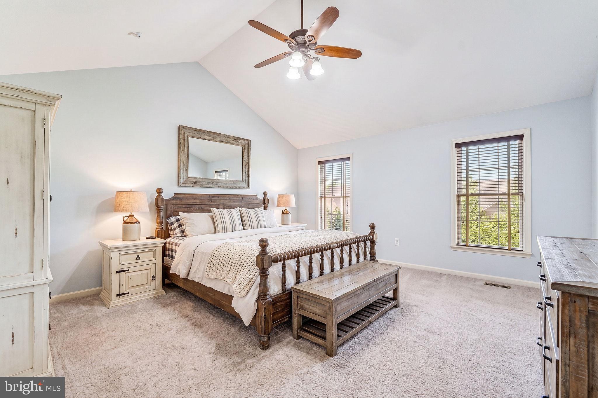 2422 Rippling Brook Road Frederick, MD 21701 - Photo 16 of 35 a spacious bedroom with a bed and a window
