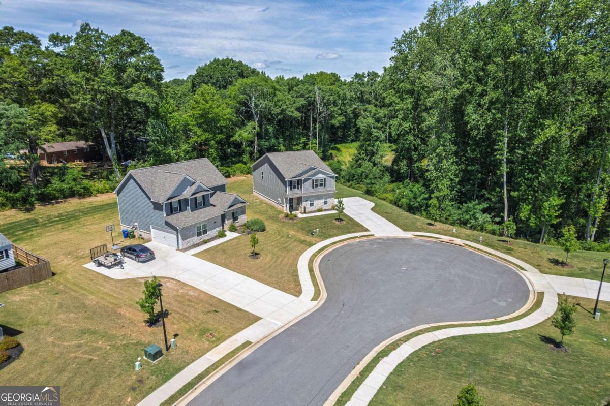 653 Meadows Farm Way Monroe, GA 30655 - Photo 3 of 34 swimming pool view with a backyard space