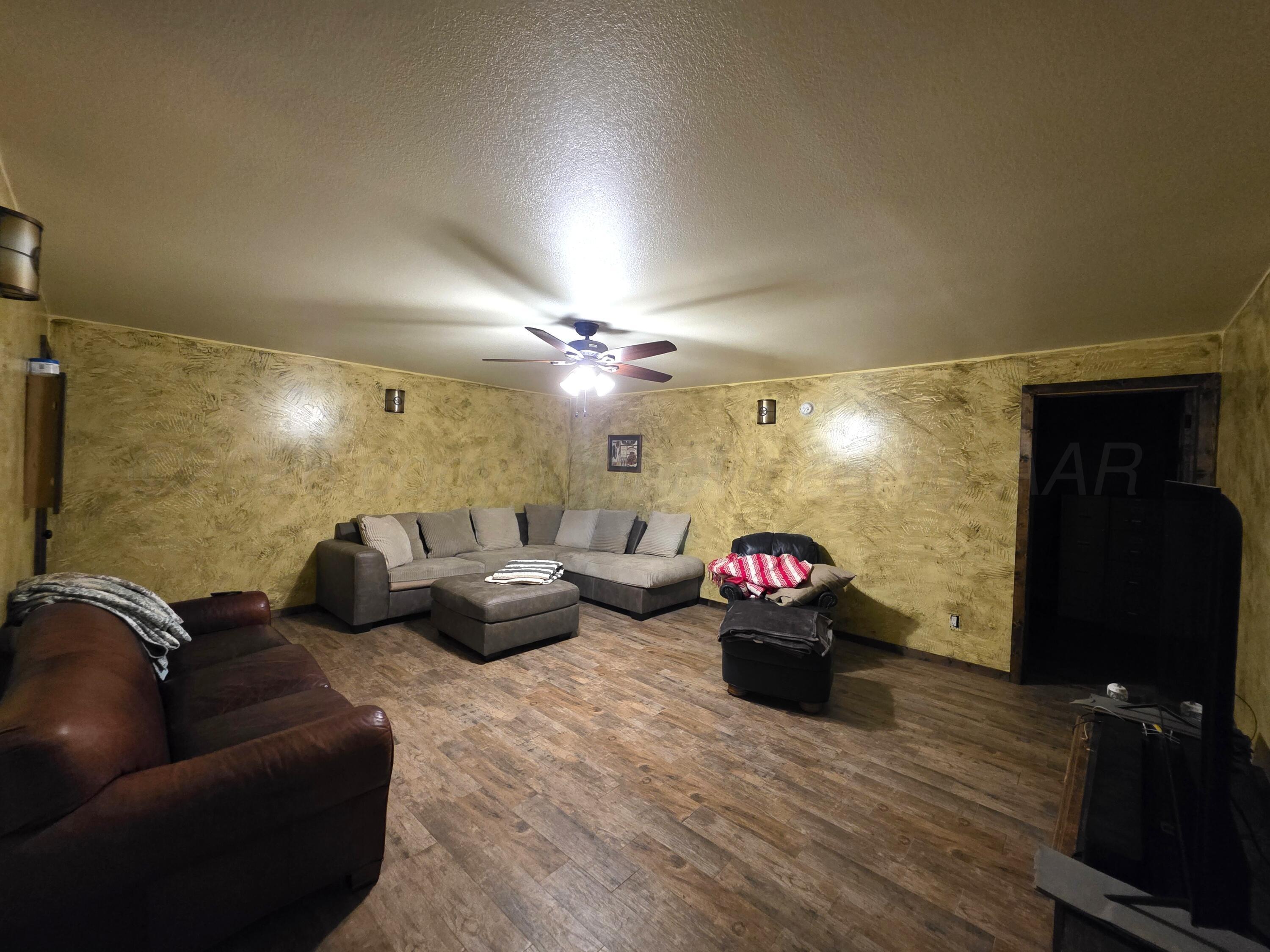 115 5th Street Mobeetie, TX 79061 - Photo 19 of 28 2nd Living Area in Basement