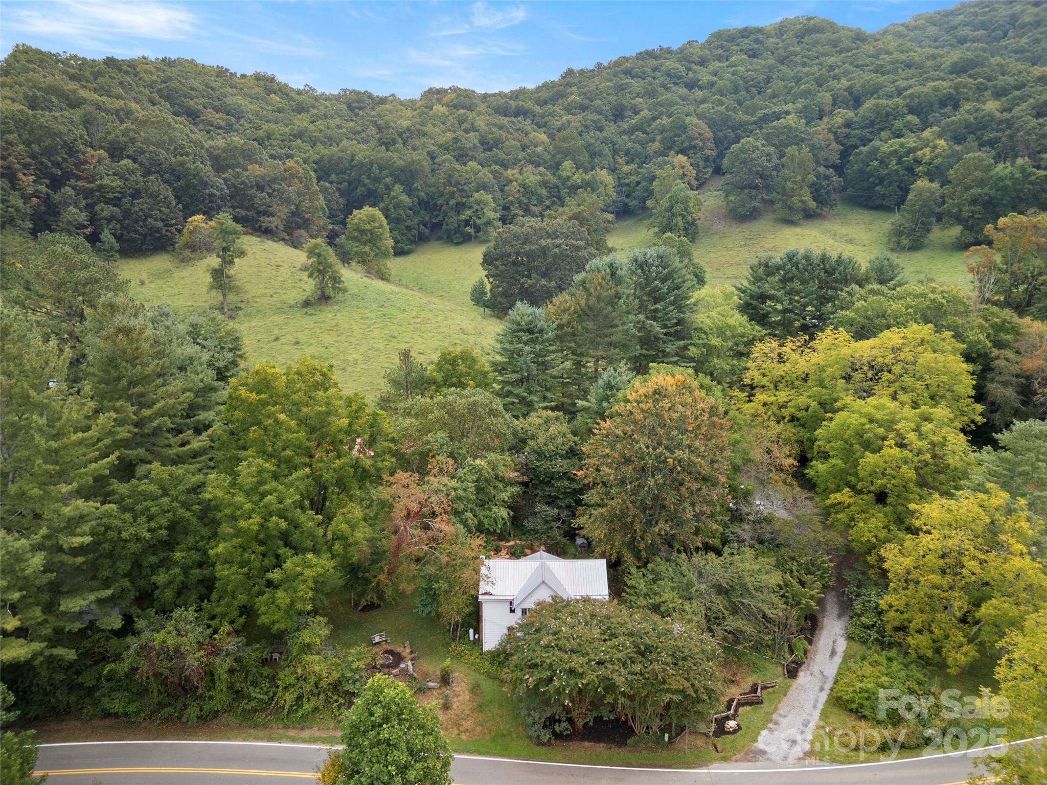 27 Barkn Cove Canton, NC 28716 - Photo 2 of 32 an aerial view of residential house and outdoor space
