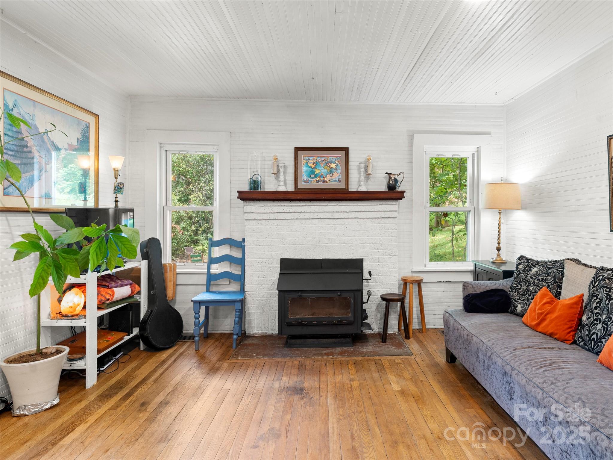 27 Barkn Cove Canton, NC 28716 - Photo 5 of 32 a living room with furniture and a fireplace