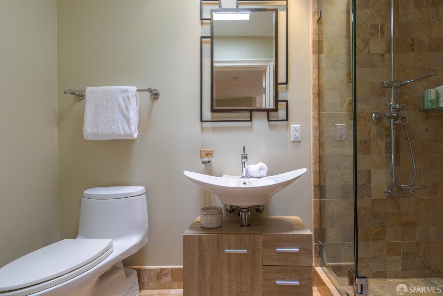 155 Upland Drive San Francisco, CA 94127 - Photo 11 of 43 a bathroom with a toilet sink and mirror