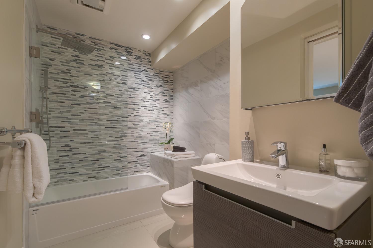 155 Upland Drive San Francisco, CA 94127 - Photo 25 of 43 a bathroom with a sink a toilet and shower