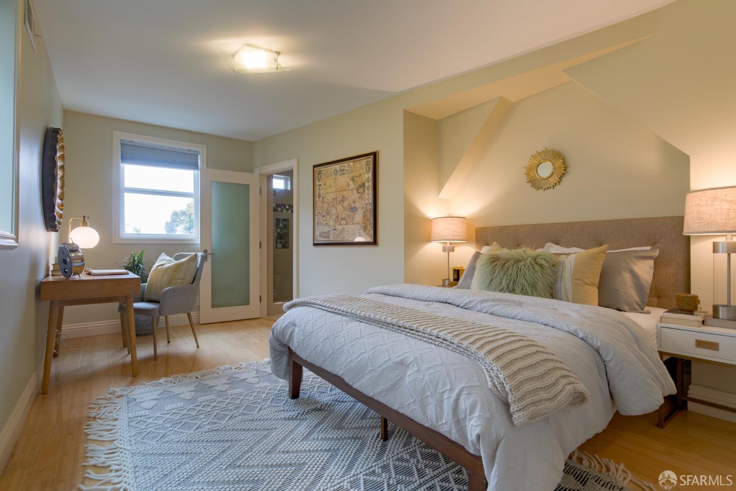 155 Upland Drive San Francisco, CA 94127 - Photo 27 of 43 a bedroom with a bed and wooden floor