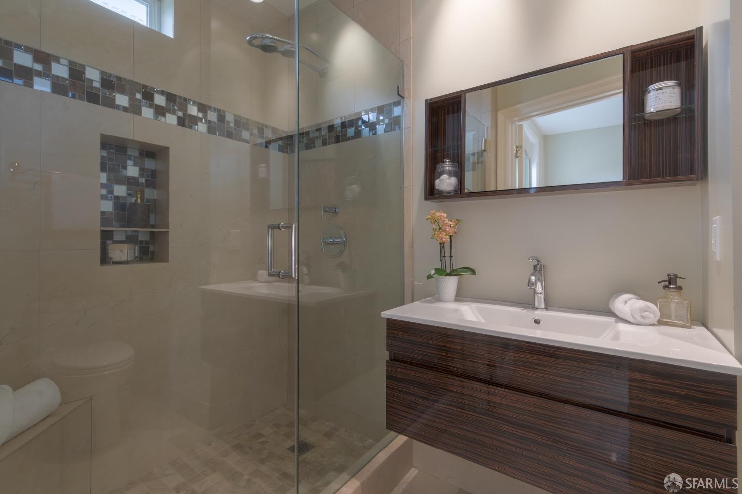 155 Upland Drive San Francisco, CA 94127 - Photo 28 of 43 a bathroom with a sink a toilet and shower