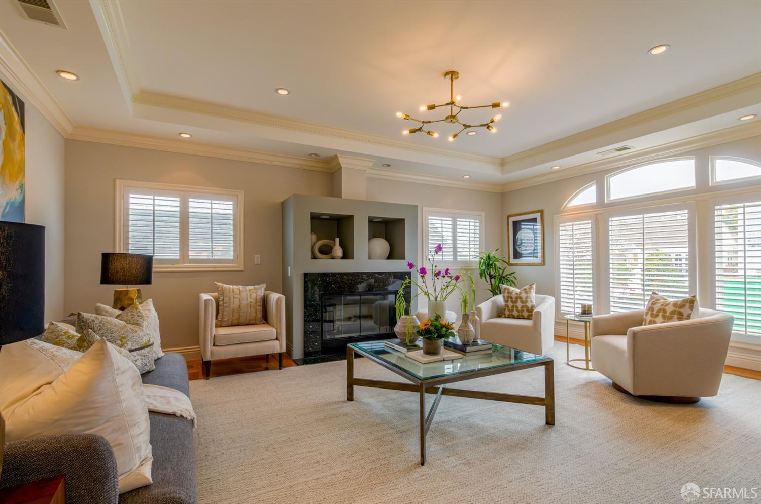 155 Upland Drive San Francisco, CA 94127 - Photo 3 of 43 a living room with furniture and a fireplace