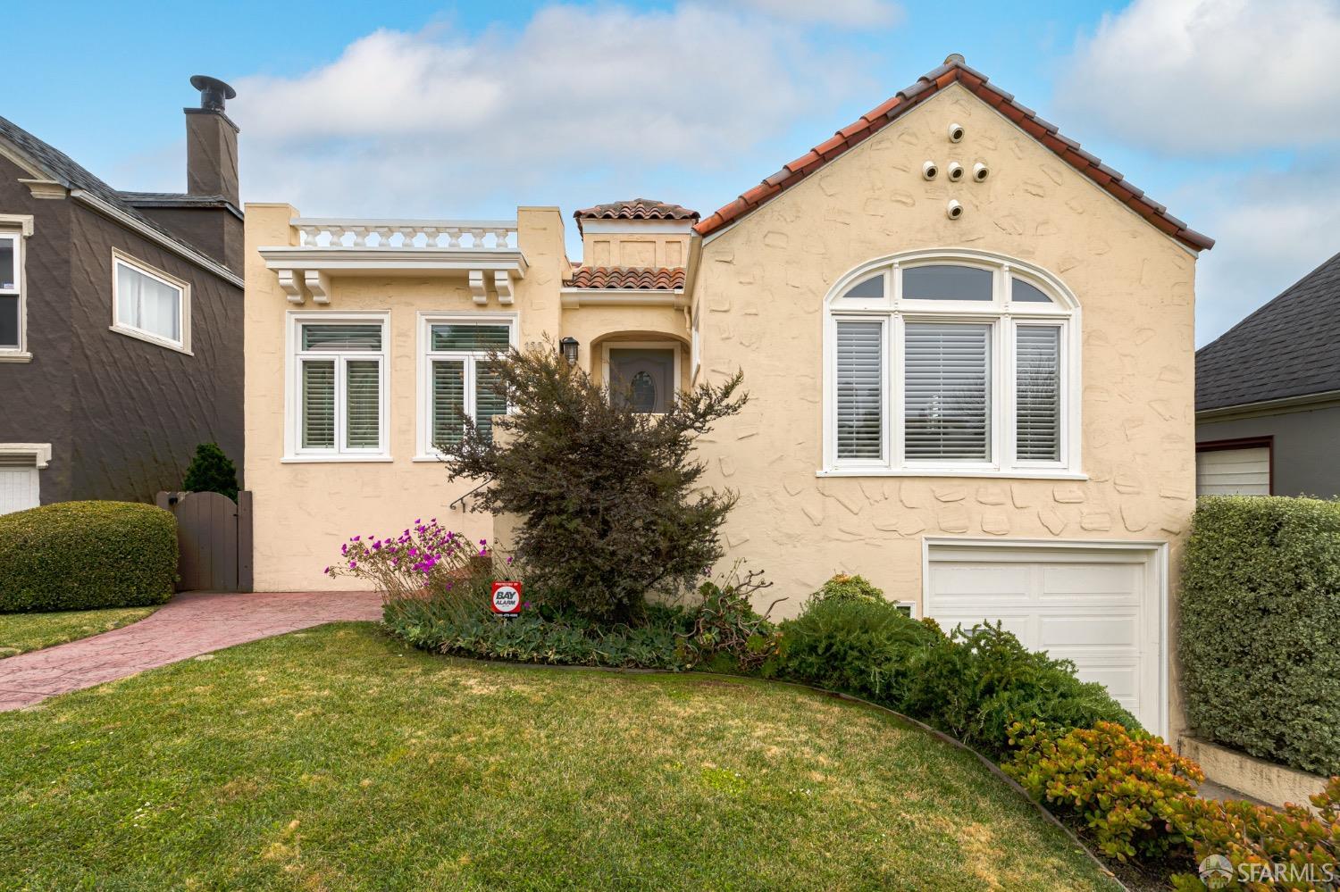 155 Upland Drive San Francisco, CA 94127 - Photo 37 of 43 a front view of a house with garden
