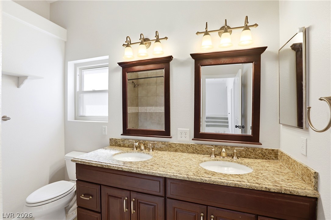 3692 River Canyon Road Las Vegas, NV 89129 - Photo 61 of 91 Spare bathroom upstairs- double sinks!