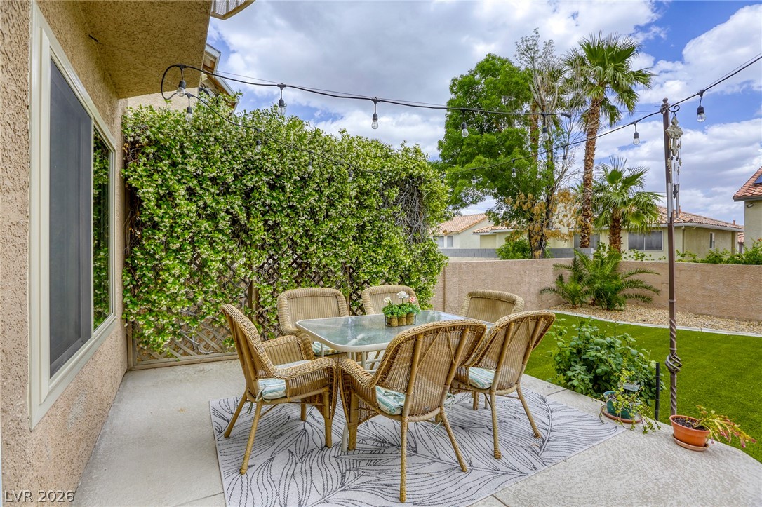 3692 River Canyon Road Las Vegas, NV 89129 - Photo 71 of 91 Raised patio outside kitchen- great place to enjoy dinner!