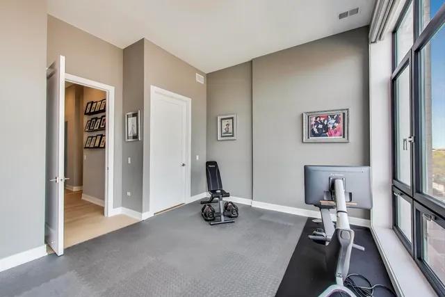 a view of a room with gym equipment