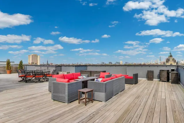 a outdoor view with a sitting space and furniture