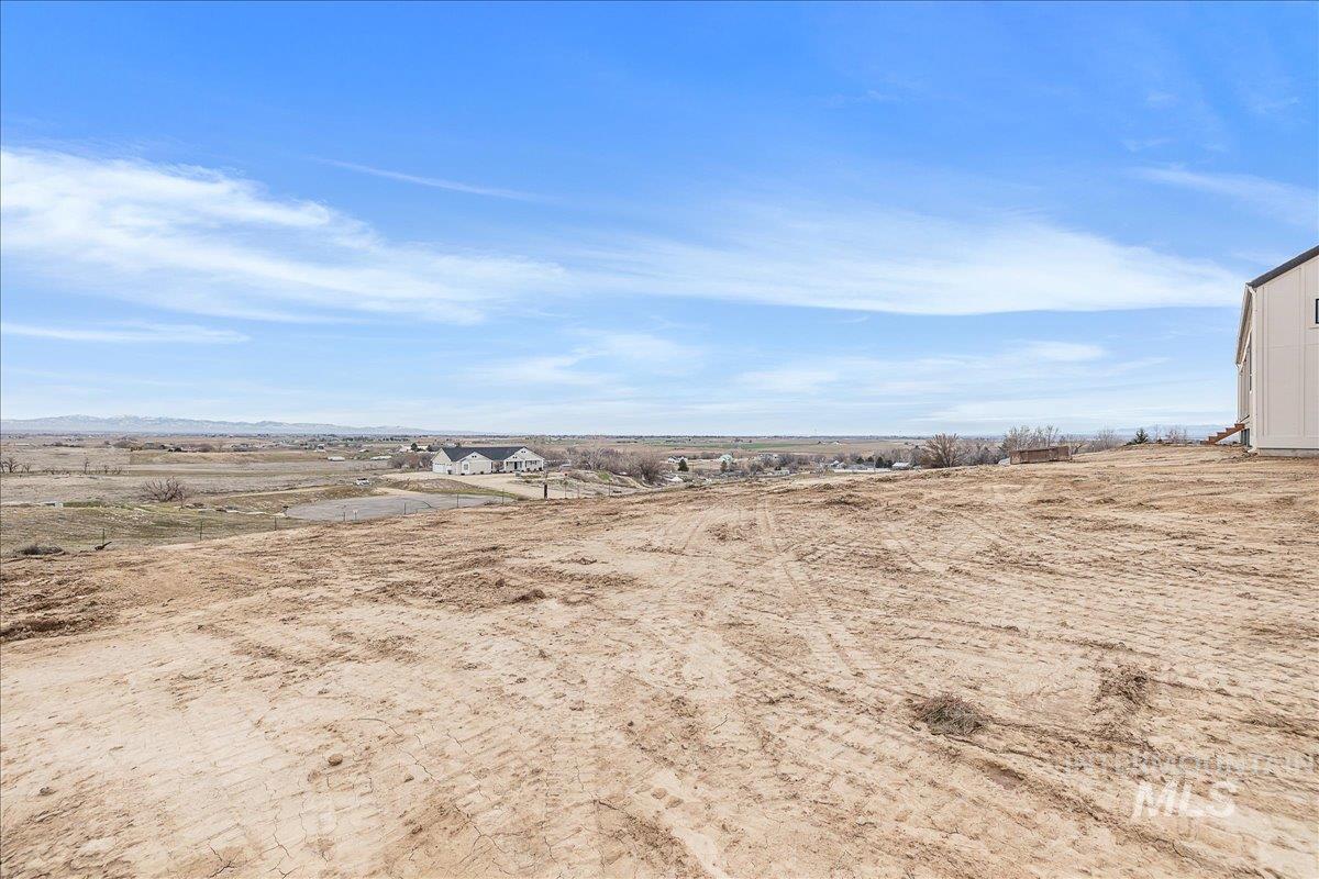 27202 Iron Horse Caldwell, ID 83607 - Photo 31 of 39 View of yard featuring a rural view