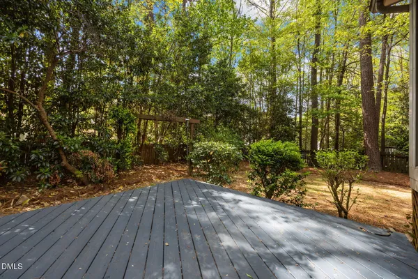 a view of outdoor space with wooden floor