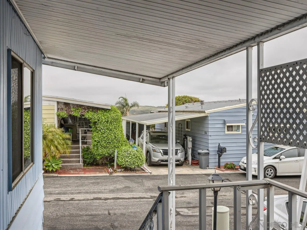 104 Havenview Lane Oceanside, CA 92056 - Photo 11 of 16 a front view of house with yard