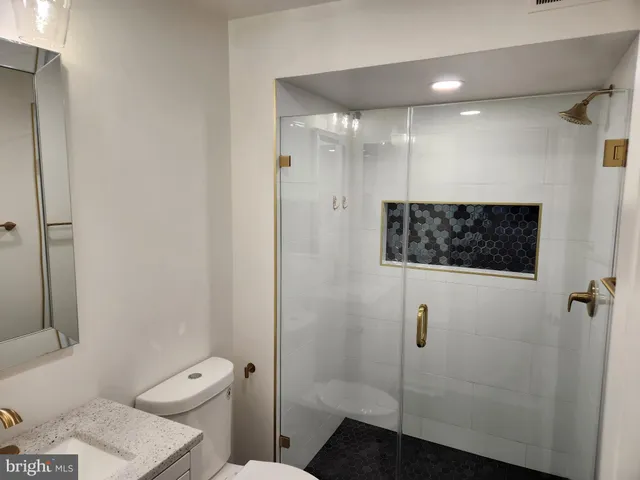 a kitchen with a stove and a microwave