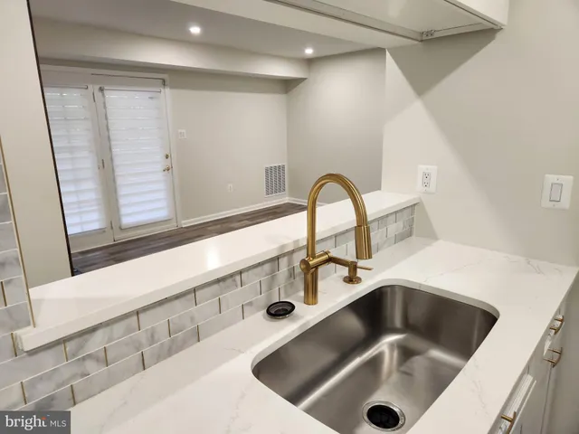 a close view of a sink and tap