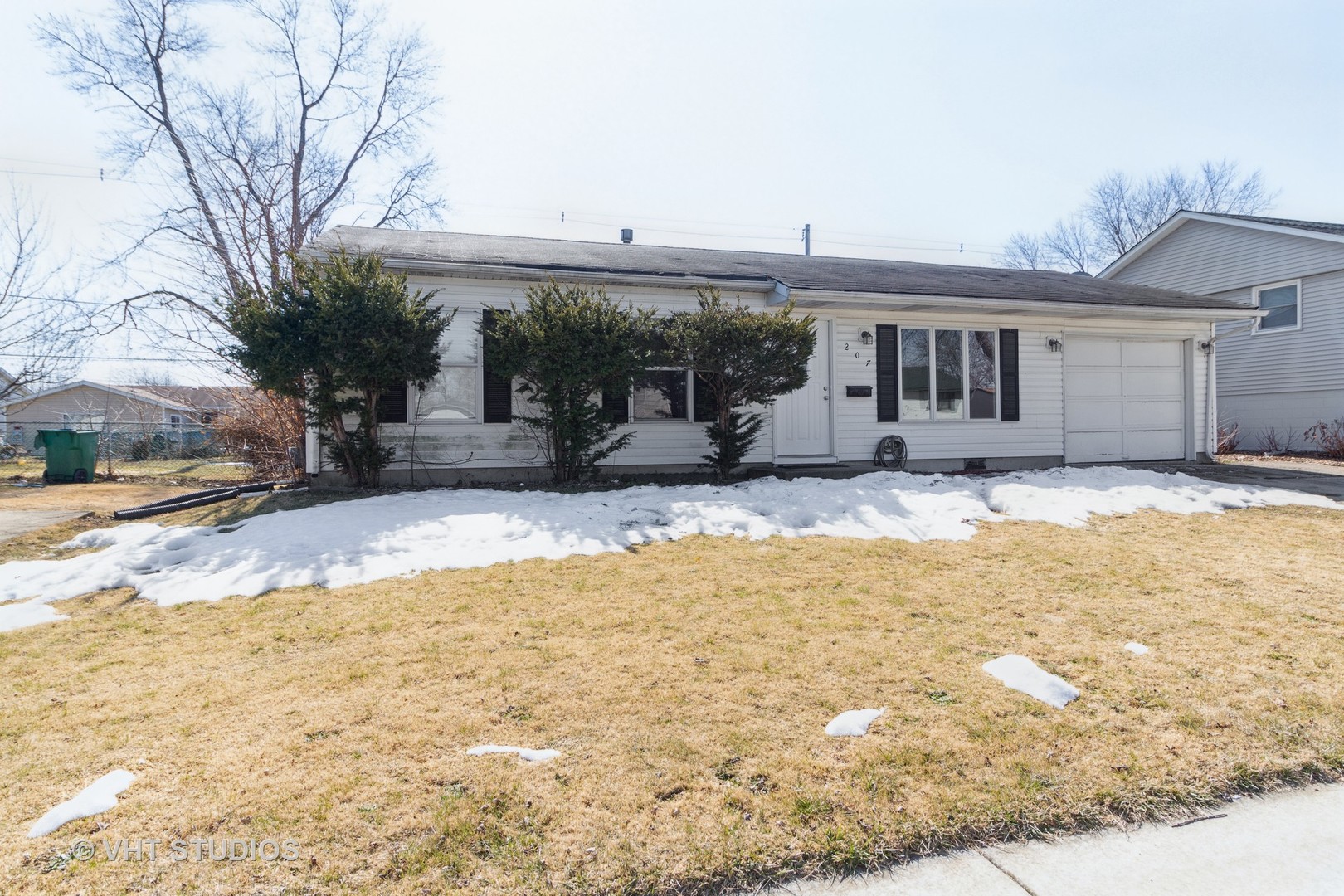 207 Haller Avenue Romeoville, IL 60446 - Photo 1 of 10 a view of a house with snow on the roof