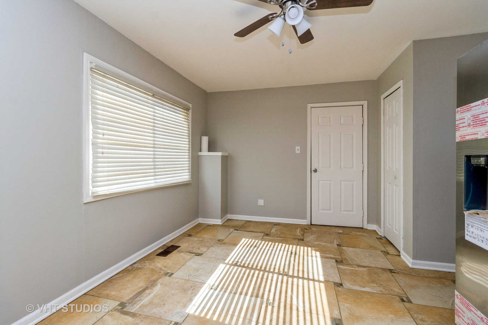 207 Haller Avenue Romeoville, IL 60446 - Photo 8 of 10 a view of a room with a flat screen tv