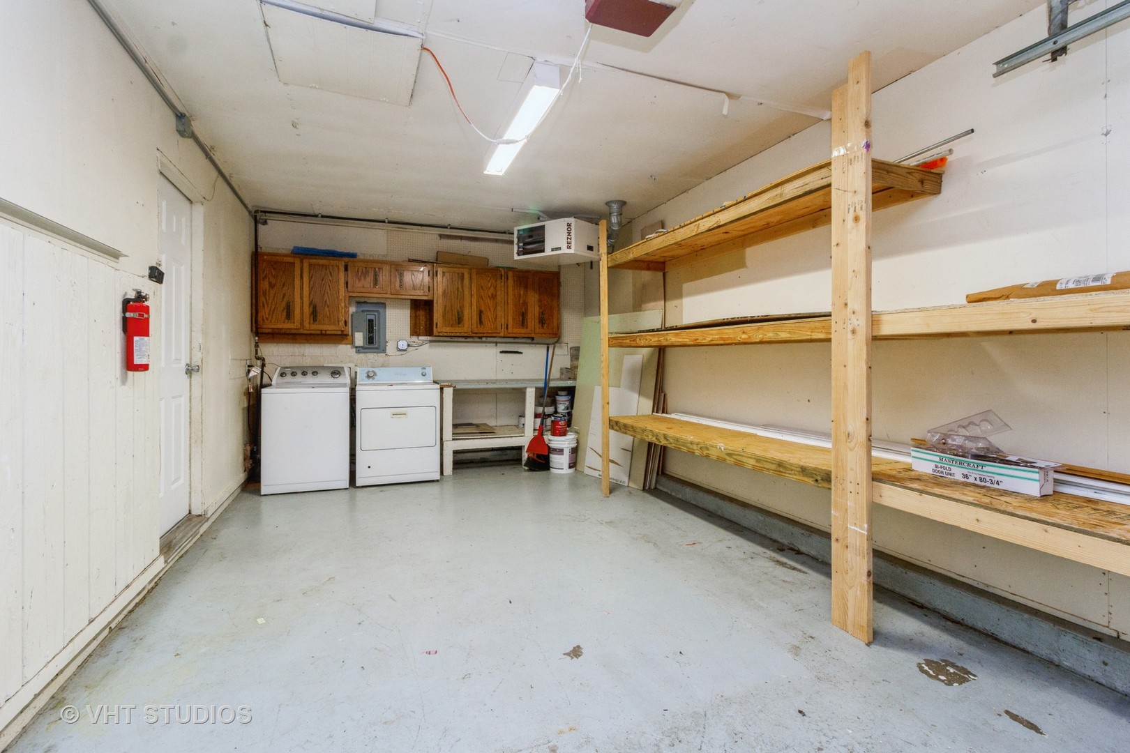 207 Haller Avenue Romeoville, IL 60446 - Photo 9 of 10 a storage room with washer and dryer