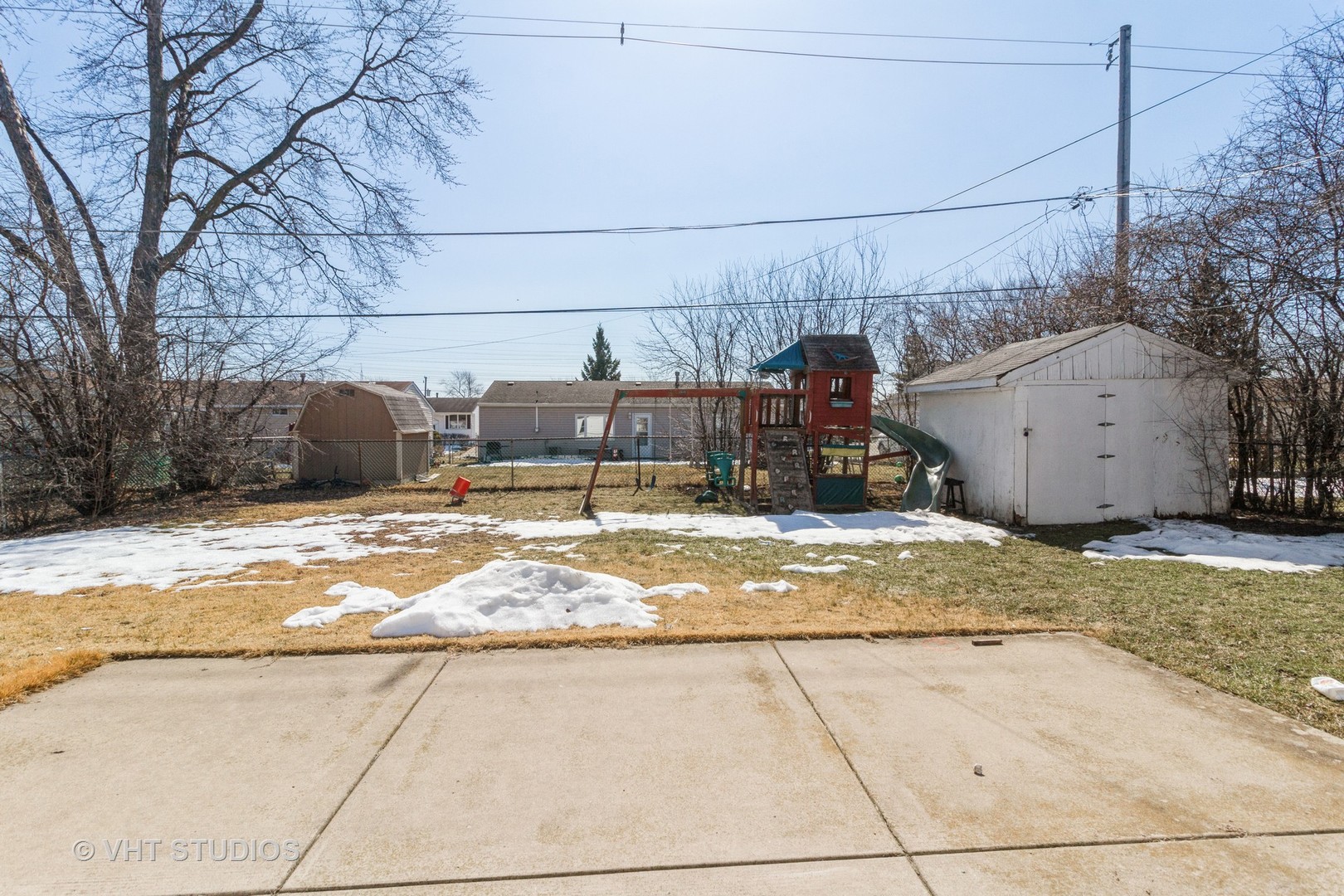 207 Haller Avenue Romeoville, IL 60446 - Photo 10 of 10 a view of a house with a snow on the road