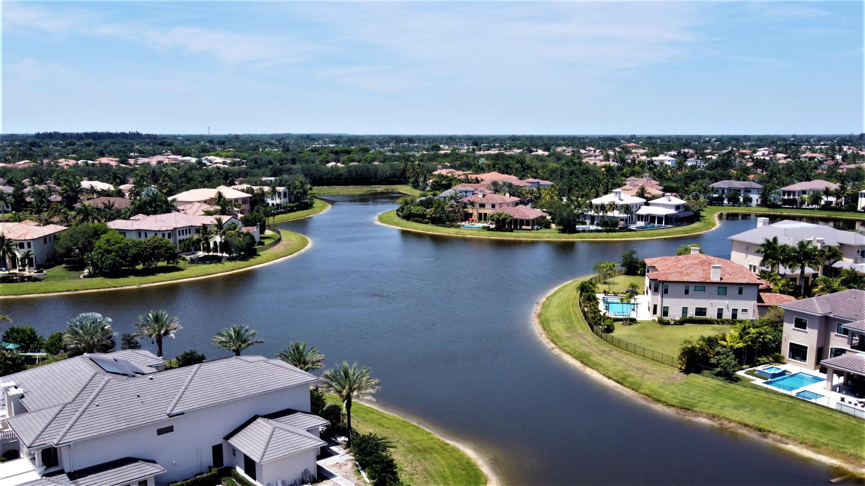 17583 Cadena Drive Boca Raton, FL 33496 - Photo 4 of 5 an aerial view of a house with a swimming pool and outdoor seating