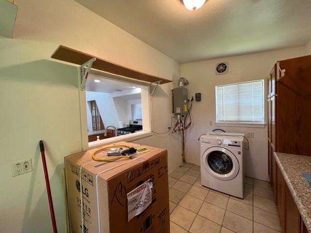 18-1976 Nau Nani Road Mountain View, HI 96771 - Photo 19 of 25 a utility room with dryer and washer