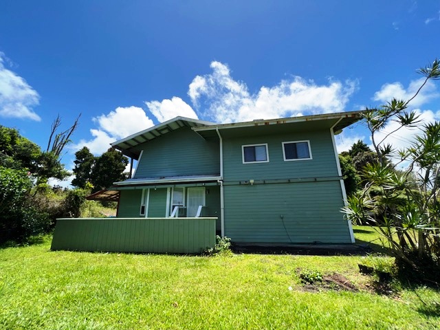18-1976 Nau Nani Road Mountain View, HI 96771 - Photo 23 of 25 a view of a house with a yard