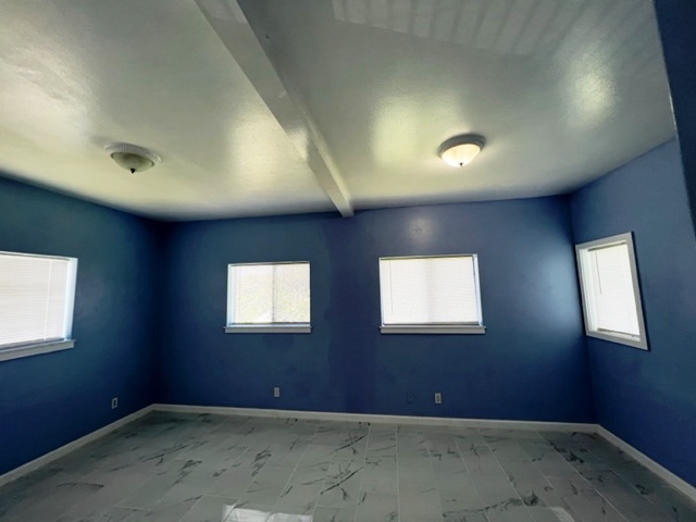 18-1976 Nau Nani Road Mountain View, HI 96771 - Photo 10 of 25 an empty room with windows