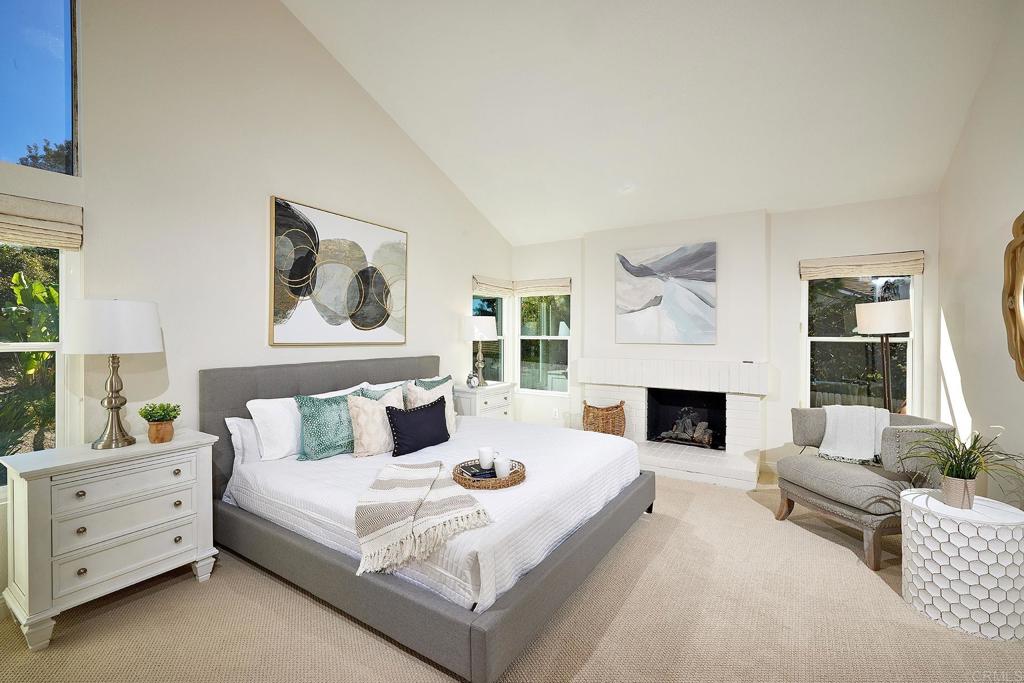 2107 Meadowgreen Court Encinitas, CA 92024 - Photo 19 of 49 a living room with furniture and a fireplace