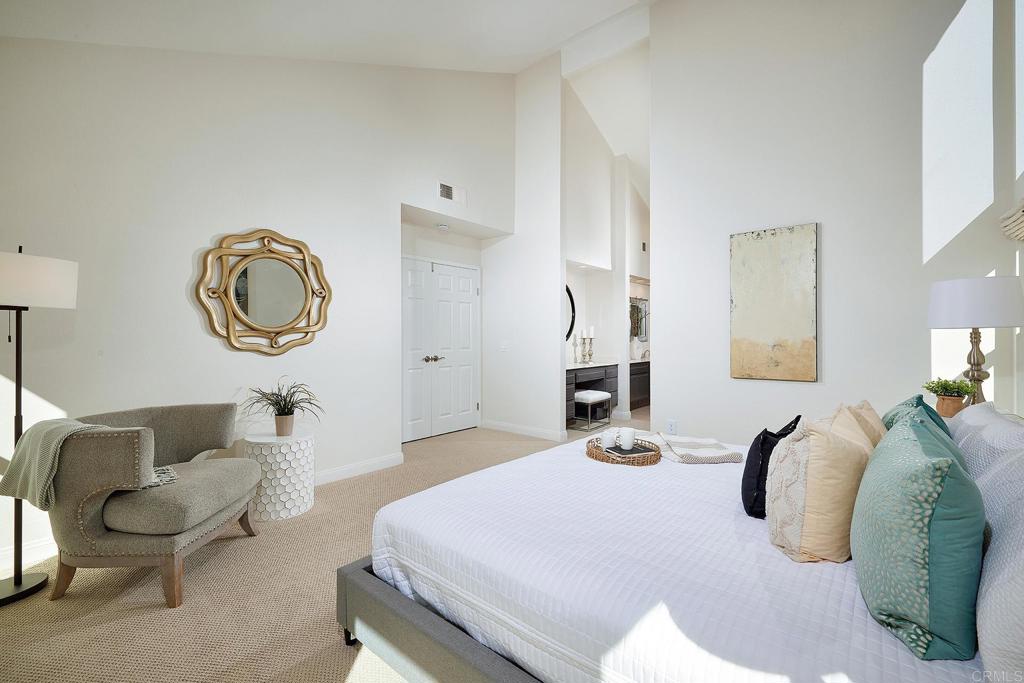 2107 Meadowgreen Court Encinitas, CA 92024 - Photo 20 of 49 a bedroom with bed and a chair